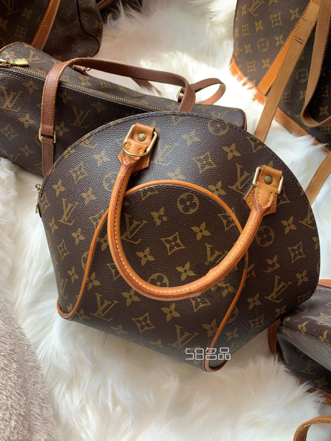 lv 中古包 河蚌包扇貝包,lv黃皮變色_1