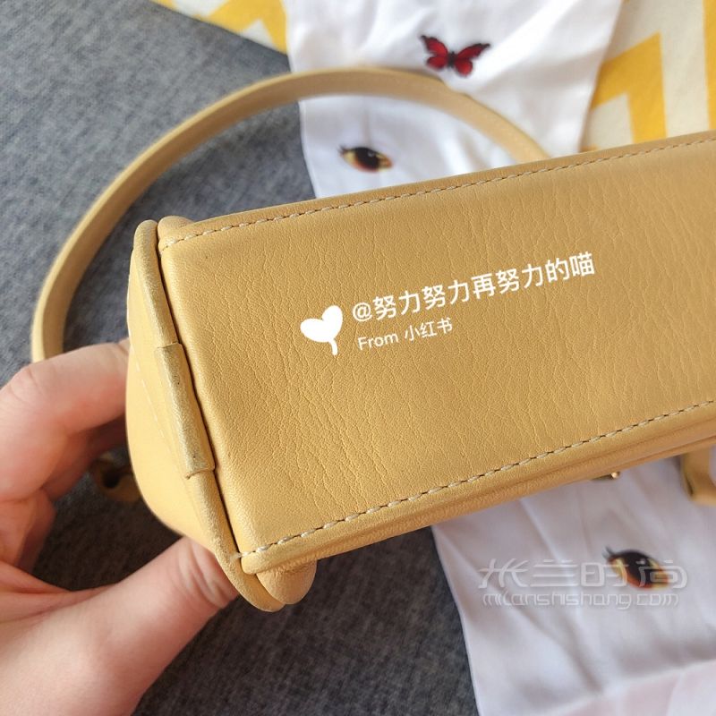 一只奶油黃- old coach小可愛枕頭腋下包_7