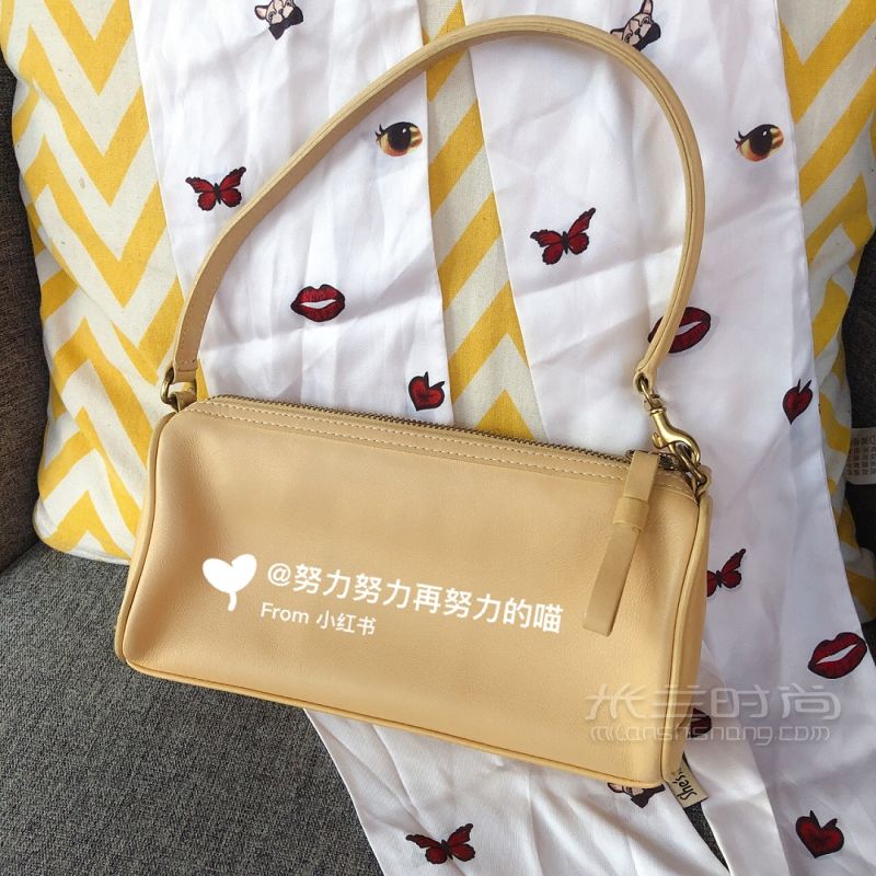 一只奶油黃- old coach小可愛枕頭腋下包_3